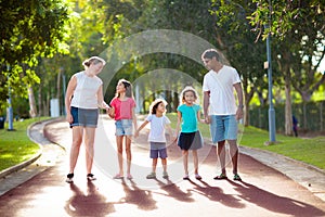 Family in summer park. Parents and kids outdoor