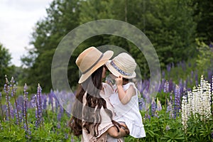 Family during summer vacation in wood glade