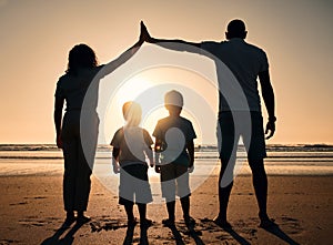 Family, sunset and outdoor silhouette at beach with children and parents together at sea for security. Man, woman and