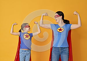 Family in Superhero costumes