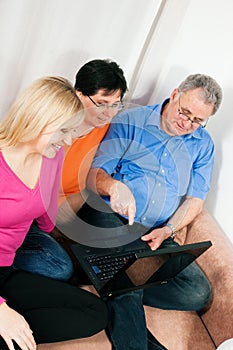 Family surfing the internet