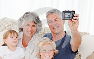 Family taking a photo of themselves