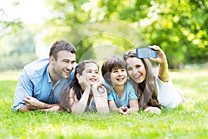 Family taking photo of themselves