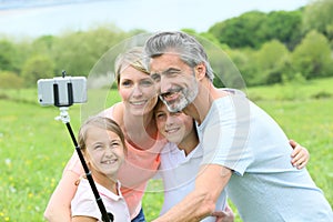 Family taking selfie on holidays