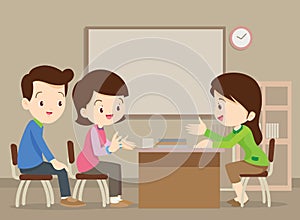 Family talking with teacher