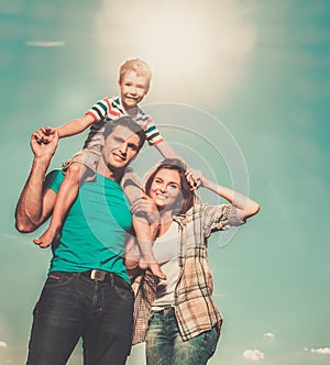 Family with their child outdoors