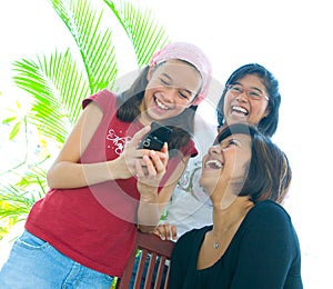 Family of three girls in fun expression