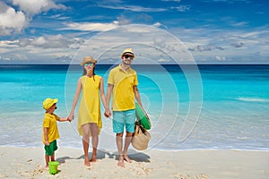 Family with three year old boy on beach. Seychelles, Mahe