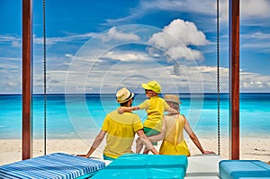 Family with three year old boy on beach. Seychelles, Mahe