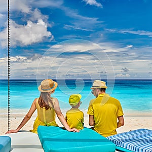 Family with three year old boy on beach. Seychelles, Mahe