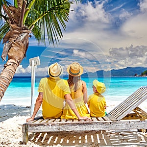 Family with three year old boy on beach. Seychelles, Mahe