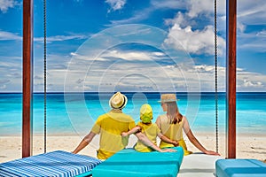 Family with three year old boy on beach. Seychelles, Mahe