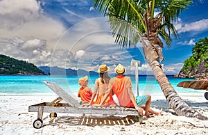 Family with three year old boy on beach. Seychelles, Mahe