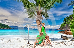 Family with three year old boy on beach. Seychelles, Mahe