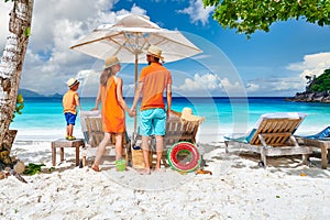 Family with three year old boy on beach. Seychelles, Mahe