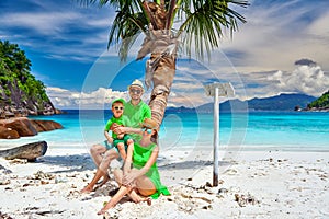 Family with three year old boy on beach. Seychelles, Mahe