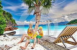 Family with three year old boy on beach. Seychelles, Mahe