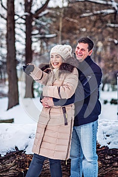 Family time - couple hugging and enjoying outdoors on beautiful