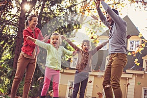 Family time, Happy family playing outside, autumn season.