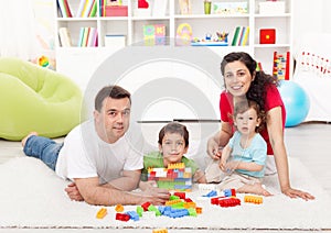 Family time - young parents with two kids playing