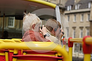 Family tourists taking pictures