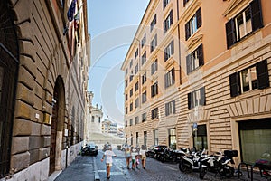 Family tourists walk in Via Daniele Manin street, Rome, Italy