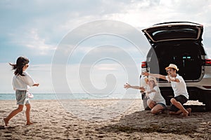 Family travel car road trip concept. summer vacation in car in the sunset, Dad, mom and daughter happy traveling enjoy and