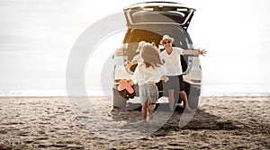 Family travel car road trip concept. summer vacation in car in the sunset, Dad, mom and daughter happy traveling enjoy and