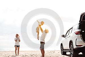 Family travel car road trip concept. summer vacation in car in the sunset, Dad, mom and daughter happy traveling enjoy and