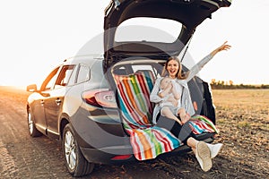 Family and travel concept, Happy family, mom and child enjoying the trip by car