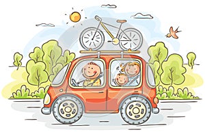 Family travelling by car in the countryside