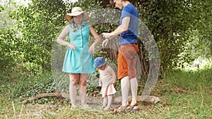 family treats the skin with a spray from insects, mosquitoes, ticks, fleas. Protection and care of health in nature