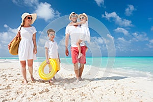 Family on a tropical beach vacation