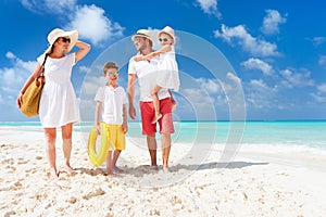 Family on a tropical beach vacation