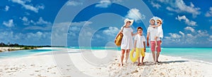 Family on a tropical beach vacation