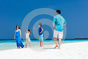 Family on a tropical beach vacation