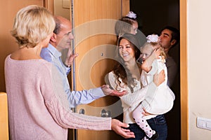 Family with two daughters visiting grand parents