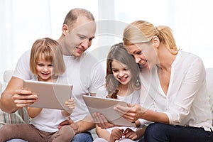 Family and two kids with tablet pc computers