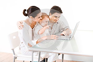Family using laptop