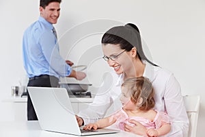 Family Using Laptop At Home