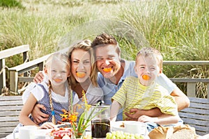 Family on vacation eating outdoors