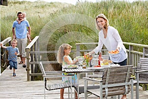 Family on vacation eating outdoors