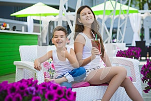 Family On Vacation Having Fun at Outdoor Pool