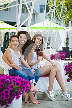 Family On Vacation Having Fun at Outdoor Pool