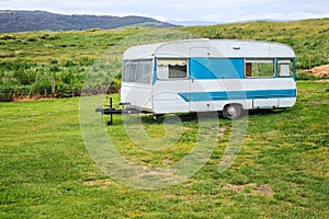 Family vacation trip, leisurely travel in motor home, Happy Holiday Vacation in Caravan camping car. Beautiful Nature New Zealand