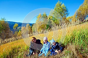 Family walk on autumn mountain Nimchich pass