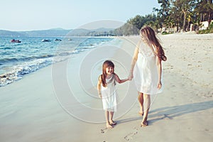 Family walking on the beach