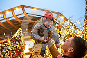 Family walking the christmas streets