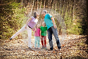 Family walking in forest