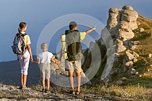 Family walking at the mountains